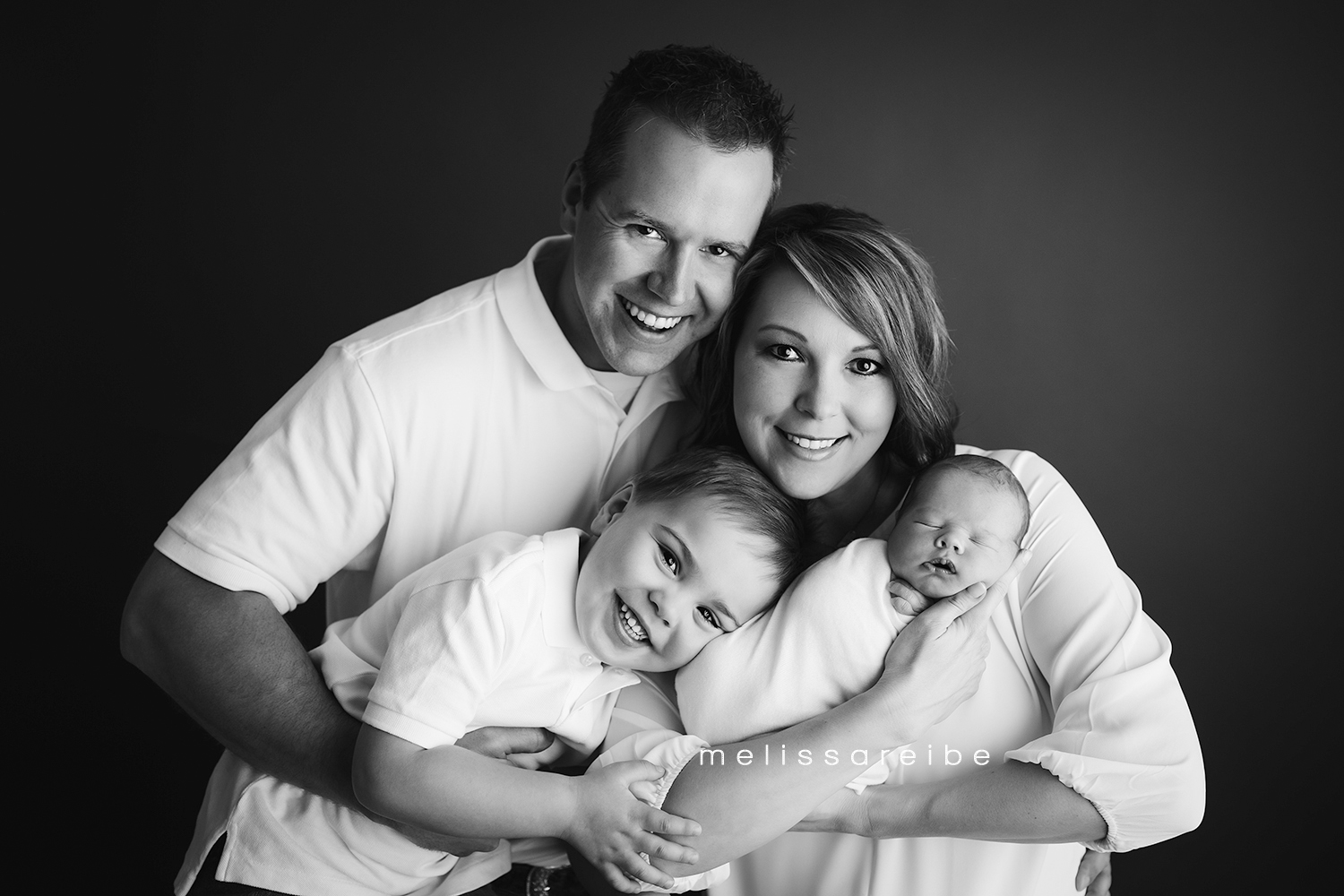 0205_Arkansas Newborn Family Photographer_Newborn Family Portrait_Black and White Family Studio Picture