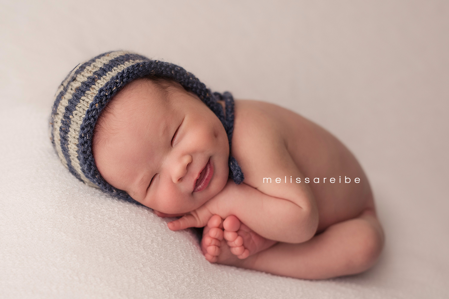 0205_Cabot Arkansas Newborn Photographer_Arkansas Newborn Photography_Newborn Smile_Gray and Navy Newborn Hat
